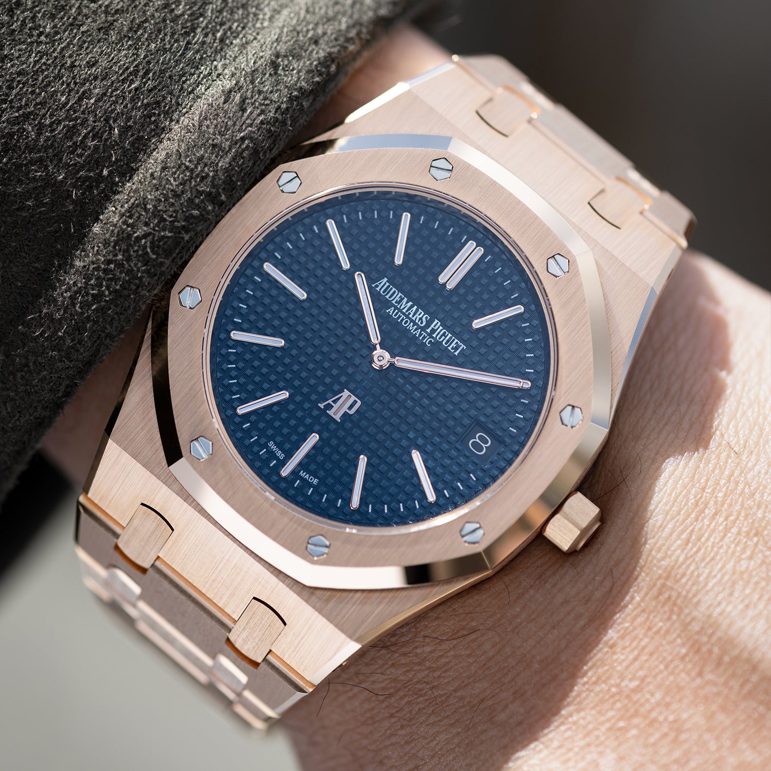 Rose Gold Audemars Piguet Royal Oak with blue dial on wrist Ref 15202OR 39mm 