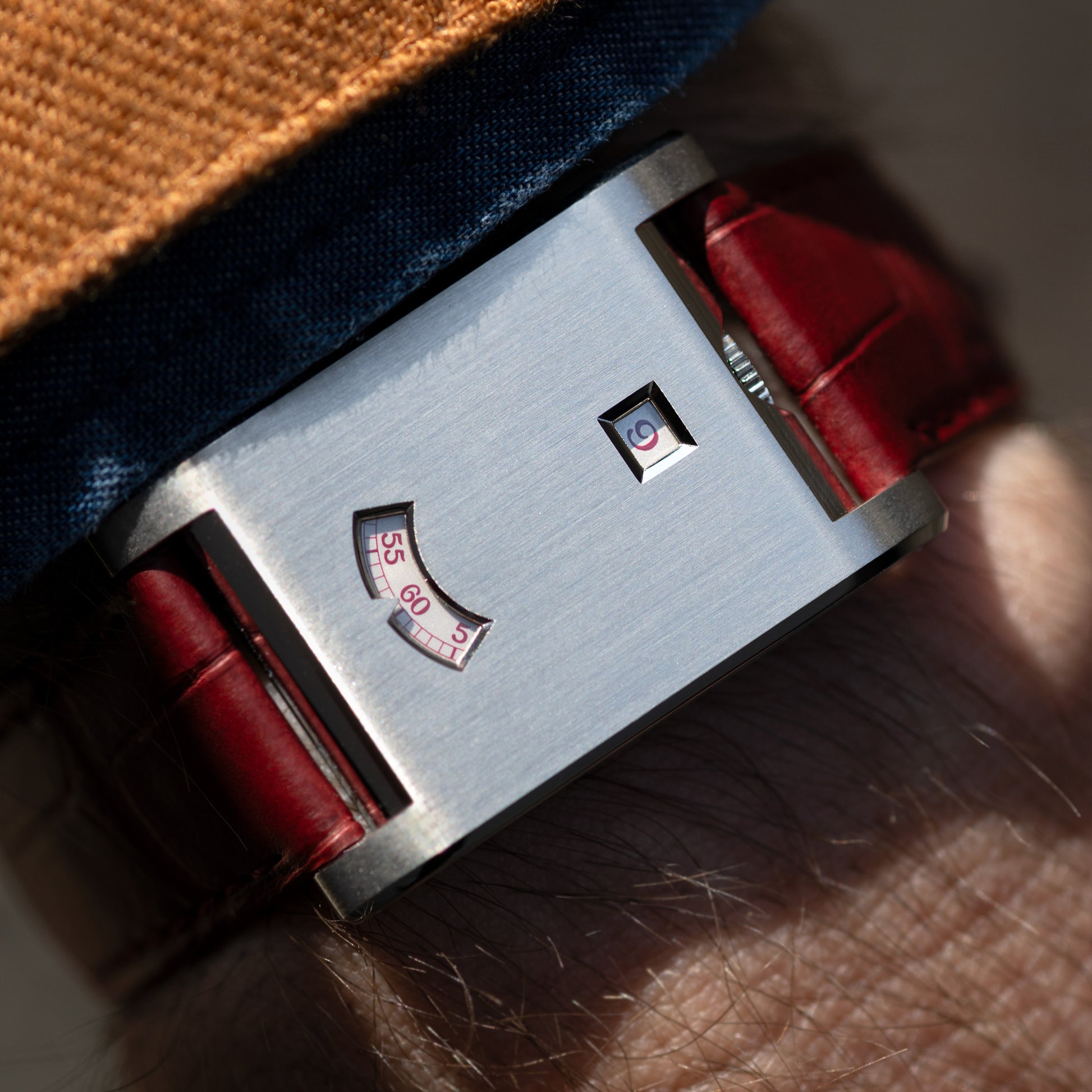 Wristshot of Platinum Cartier Tank à Guichets Ref. WGTA0236 37.6mm x 25mm