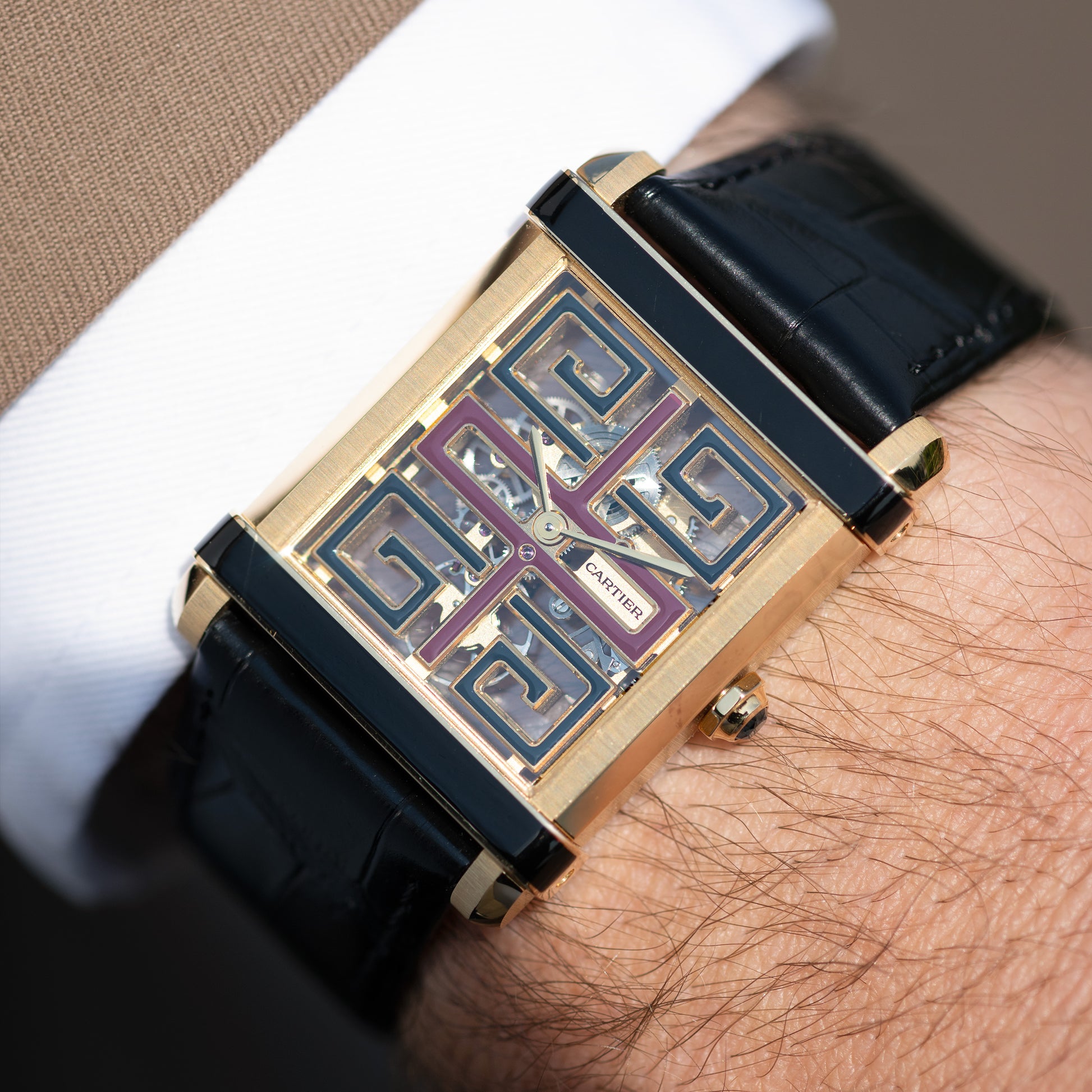 Wrist-shot of Yellow Gold Cartier Tank Chinoise Skeleton Ref. WHTA0016 39.5 mm