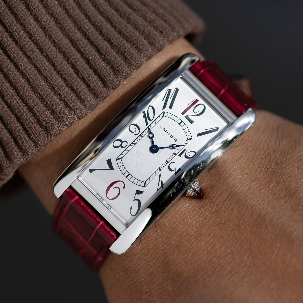 Wrist-shot of Platinum Cartier Tank Cintrée Montenapoleone Special Edition Ref. WGTA0284 46.3 mm x 23 mm