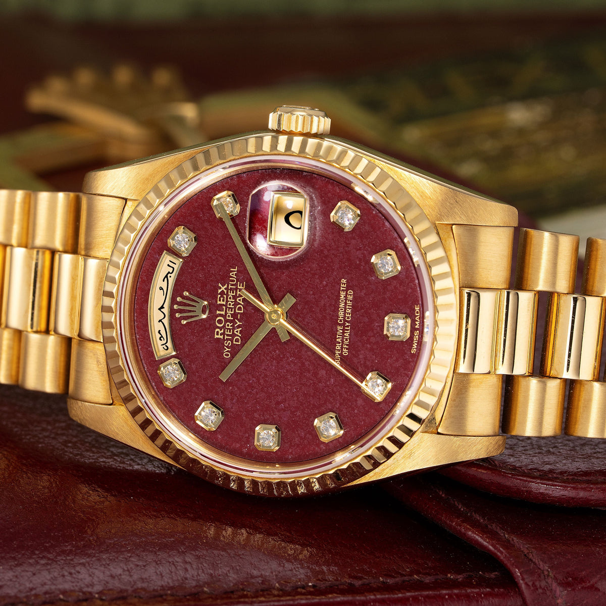 36mm Rolex Day-Date “Rubellite Dial” in 18K Yellow Gold